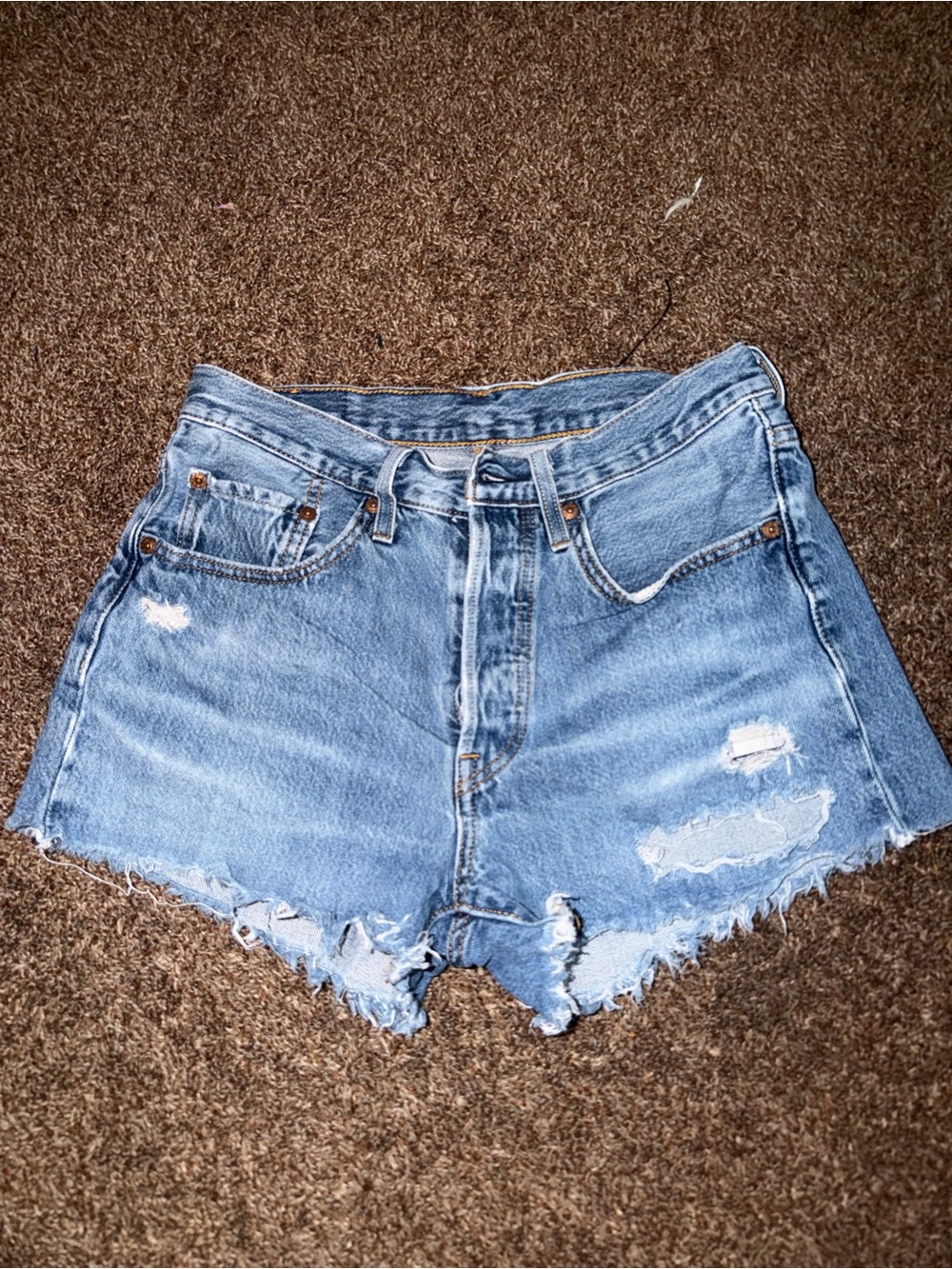 Levi’s High-Rise Light Blue Ripped Denim Shorts